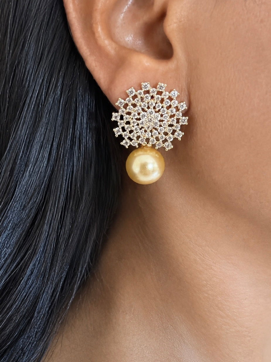 Sparkling CZ Sunburst Stud Earrings with Golden Pearl Drop