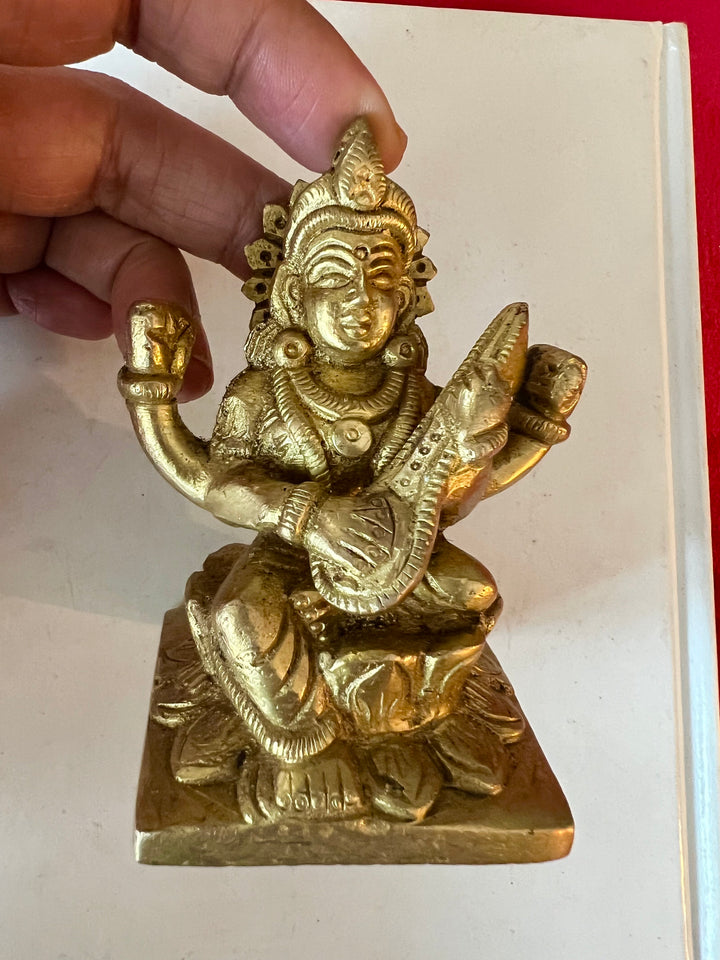 Antique Brass Saraswati Sculpture: Goddess of Wisdom