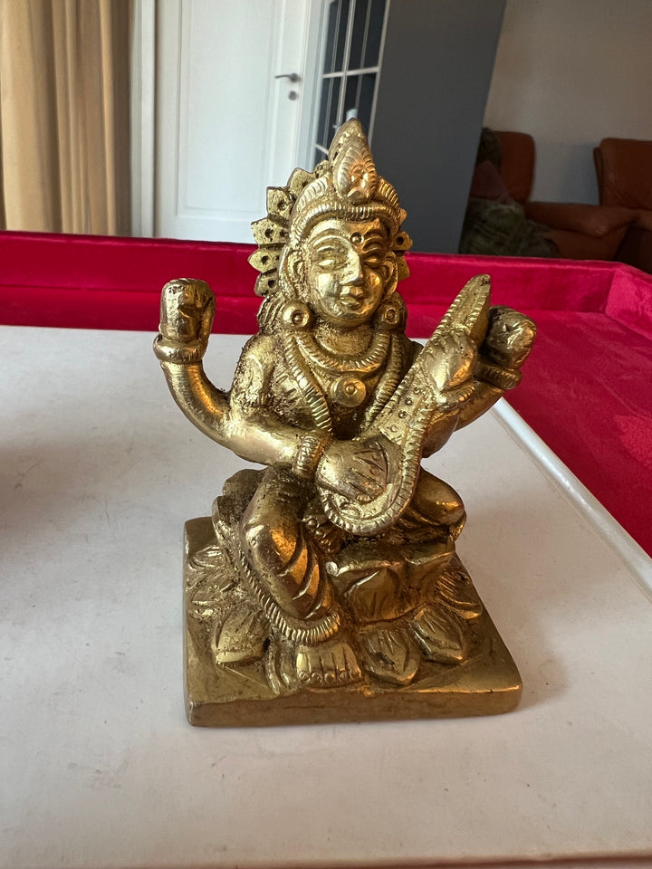 Antique Brass Saraswati Sculpture: Goddess of Wisdom