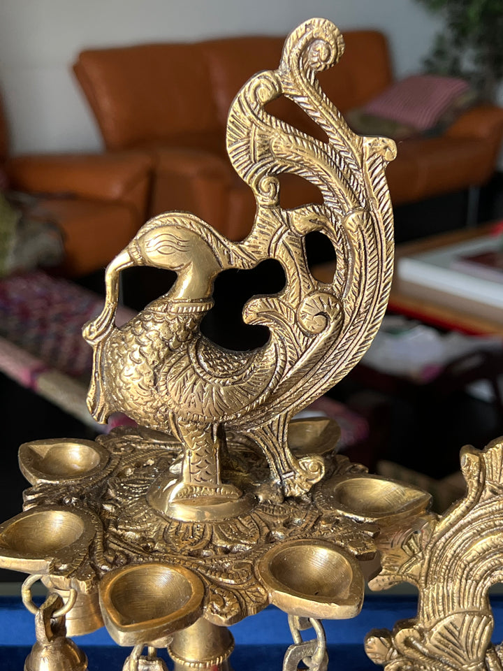 Antique Brass Peacock Bell with Diya - Ethereal Beauty and Illumination