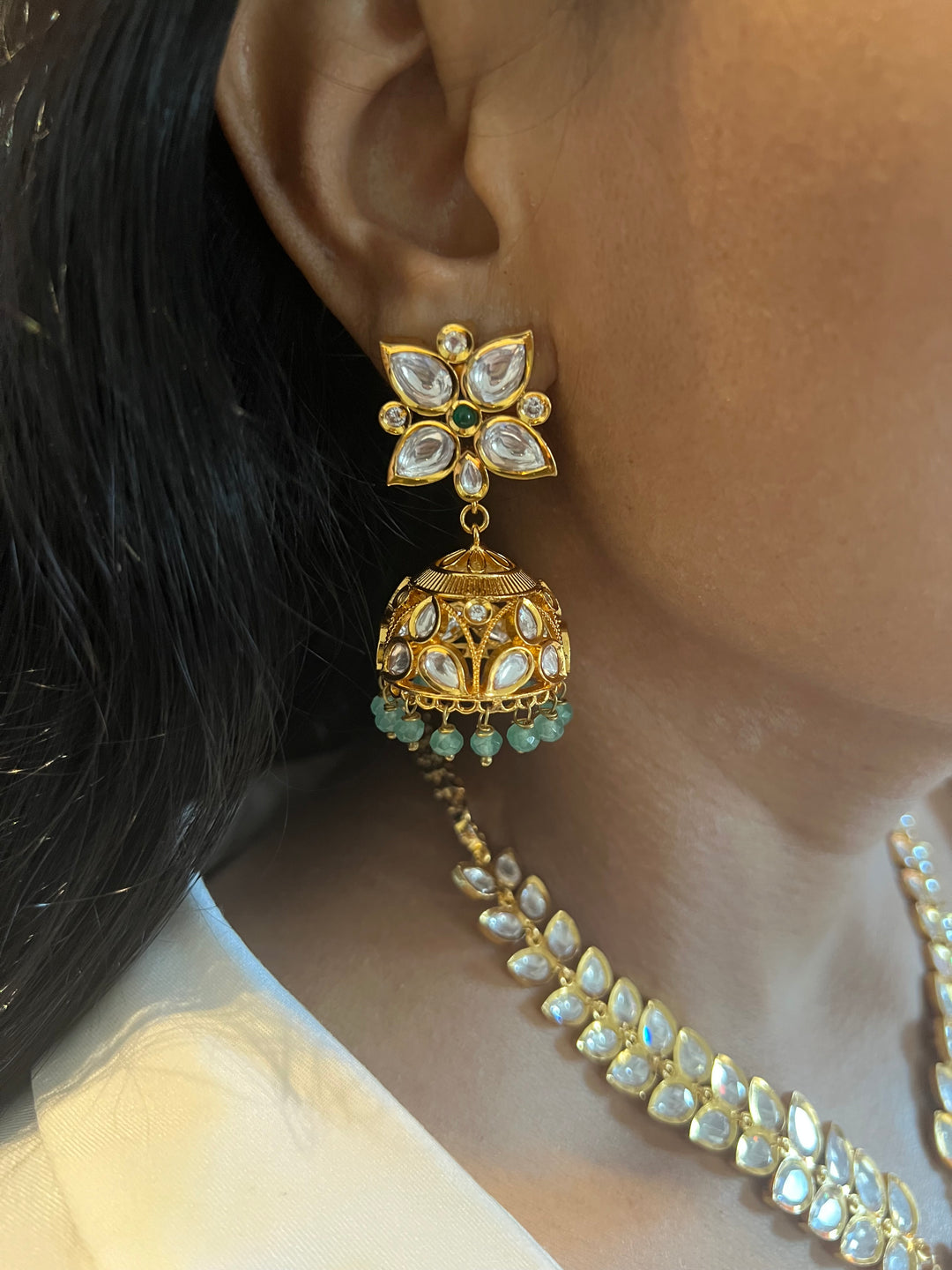 Scintillating Kundan Pendant Short Necklace with Jhumkas