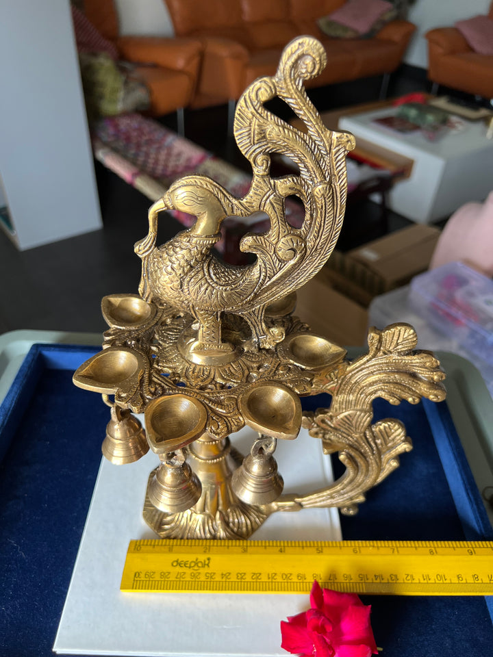 Antique Brass Peacock Bell with Diya - Ethereal Beauty and Illumination