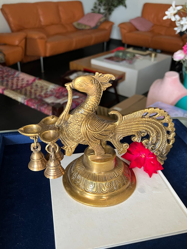 Antique Brass Peacock Bell with Diya - Ethereal Beauty and Illumination