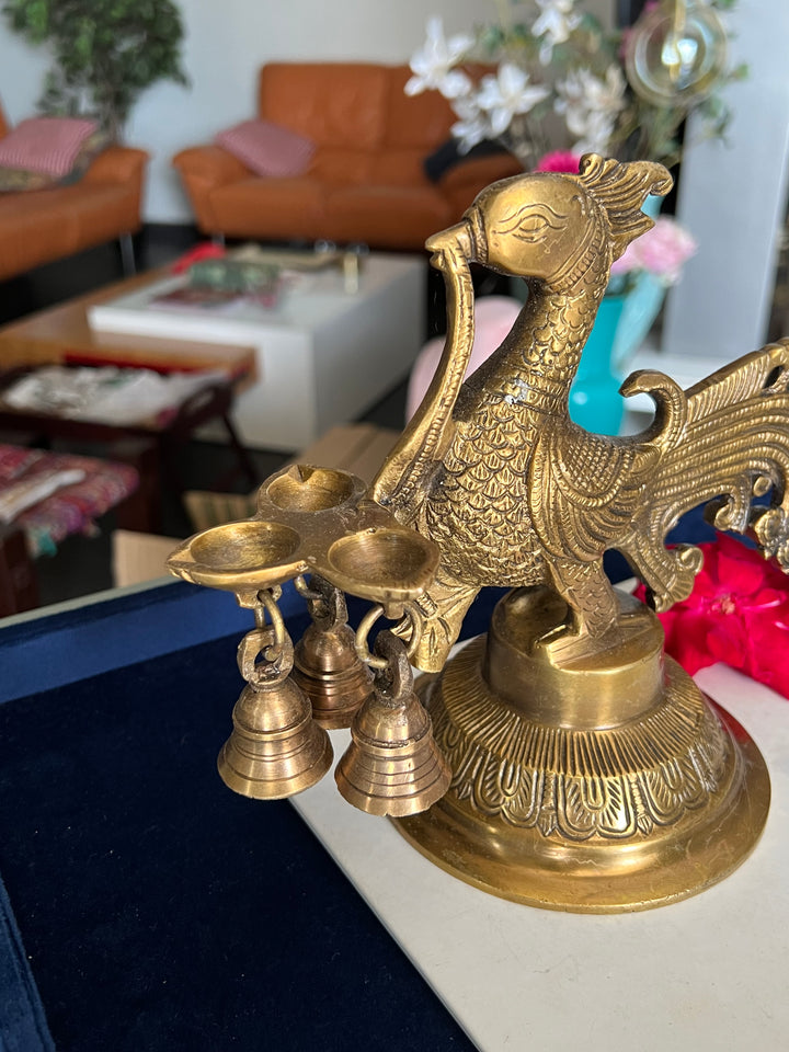 Antique Brass Peacock Bell with Diya - Ethereal Beauty and Illumination