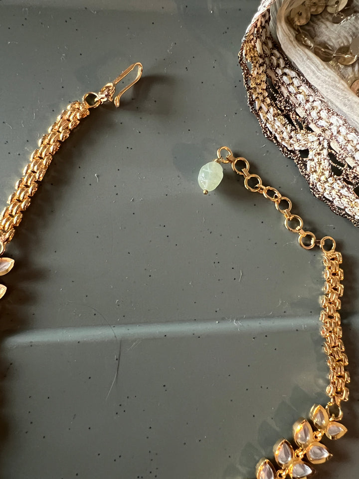 Scintillating Kundan Pendant Short Necklace with Jhumkas