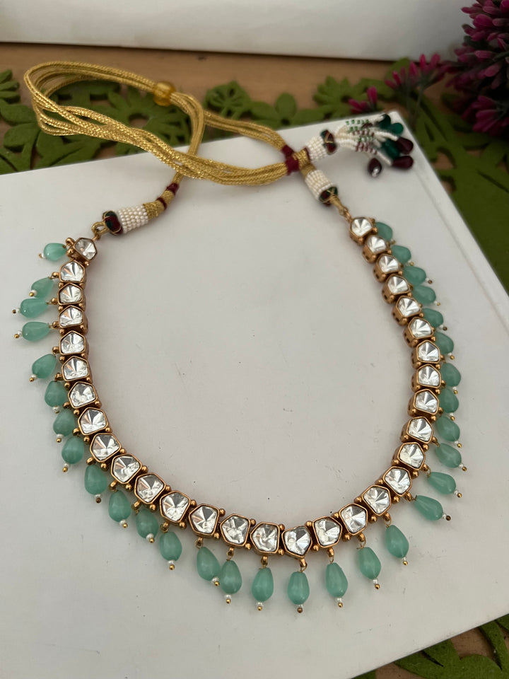 Elegant Kundan Necklace with Earrings