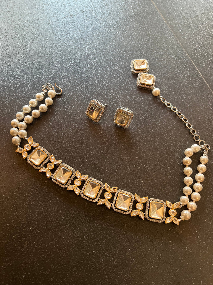 Scintillating Kundan Shell Pearls Choker with Earrings