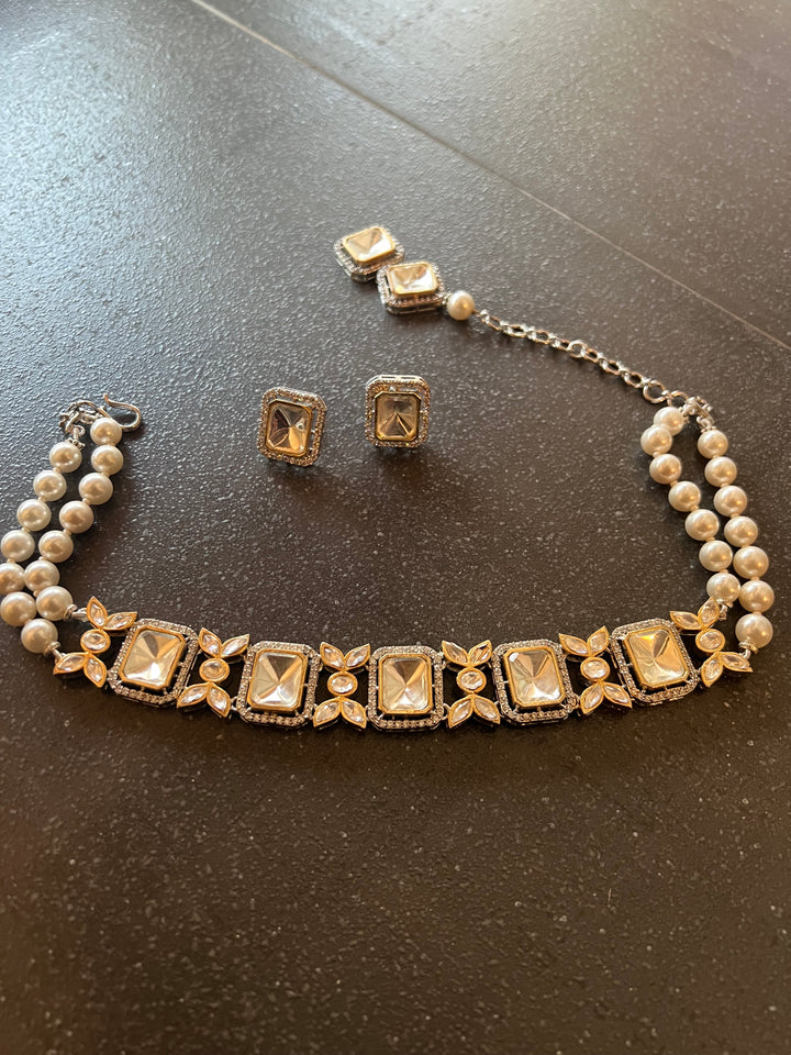 Scintillating Kundan Shell Pearls Choker with Earrings