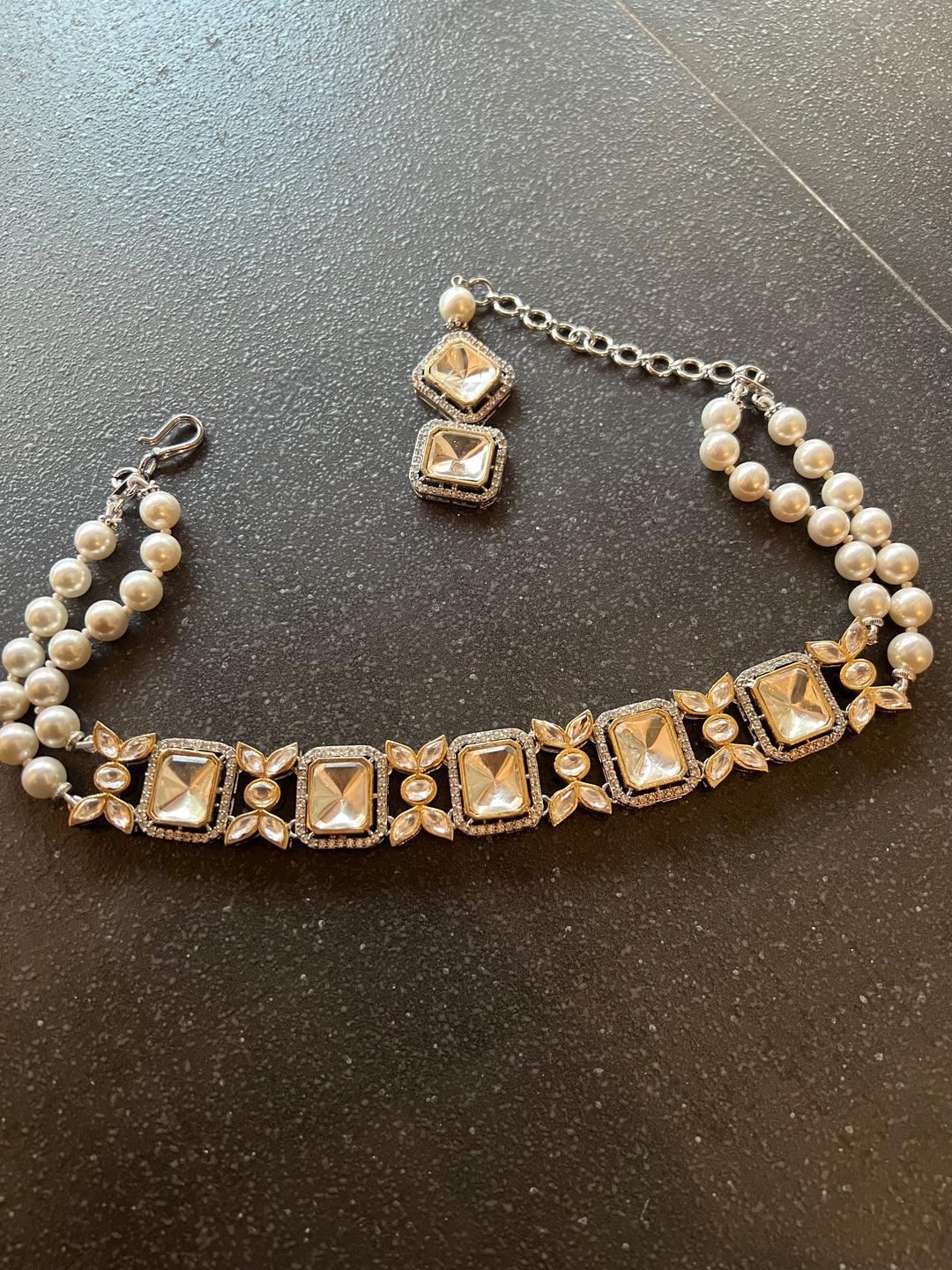 Scintillating Kundan Shell Pearls Choker with Earrings