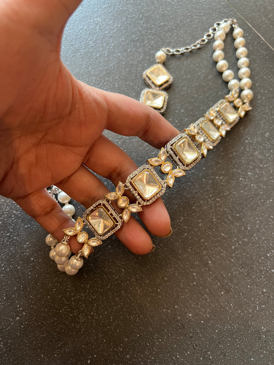 Scintillating Kundan Shell Pearls Choker with Earrings