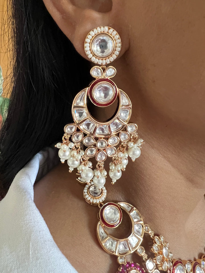 Scintillating Three Layered Kundan Necklace with Earrings