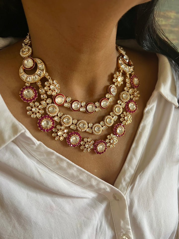 Scintillating Three Layered Kundan Necklace with Earrings